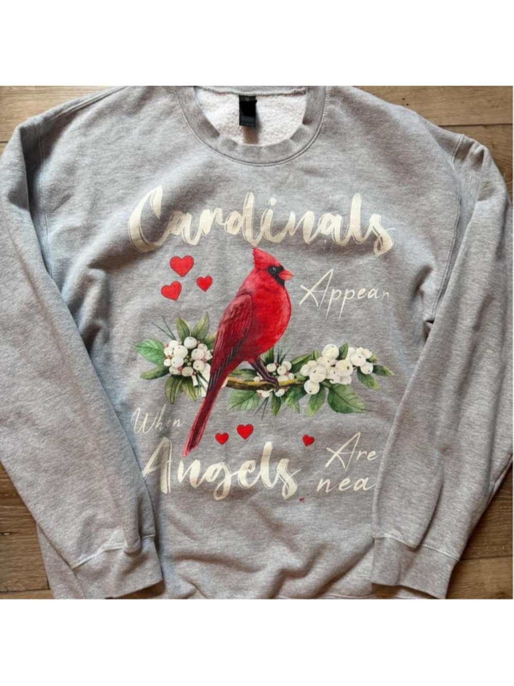Cardinal graphic crewneck sweatshirt featuring “Cardinals Appear When Angels Are